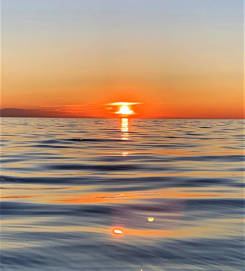 Red Bay sunset on calm water